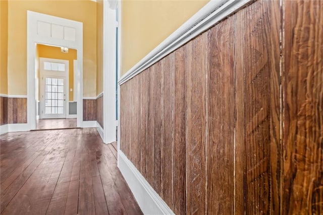 hallway with dark wood-type flooring