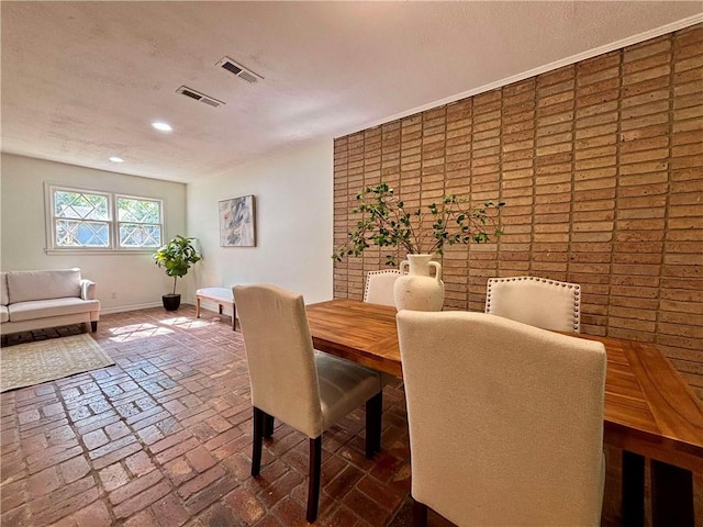 332 Syracuse St, Mobile, AL 36608 - dining area featuring recessed lighting, baseboards, and brick flooring