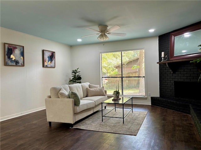 332 Syracuse St, Mobile, AL 36608 - living room featuring baseboards, ceiling fan, dark wood finished floors, a fireplace, and recessed lighting