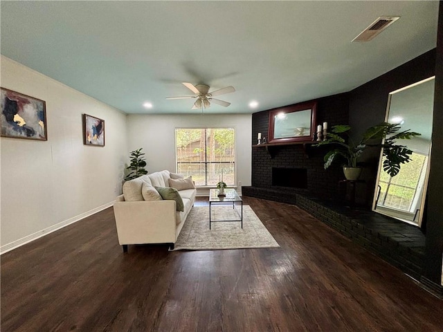 332 Syracuse St, Mobile, AL 36608 - living room with a ceiling fan, dark wood-style floors, a fireplace, baseboards, and recessed lighting