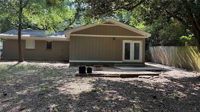 332 Syracuse St, Mobile, AL 36608 - view of outbuilding featuring fence and french doors