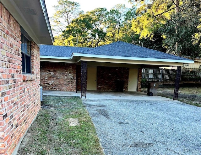 exterior space featuring a carport