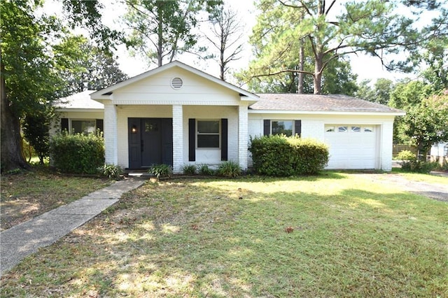 single story home with a garage, a porch, and a front yard