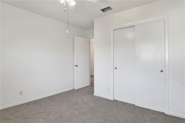 4017 Cottage Hill Rd Unit 17, Mobile, AL 36609 - unfurnished bedroom featuring carpet flooring and a closet