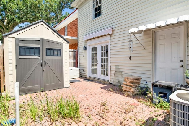 4017 Cottage Hill Rd Unit 17, Mobile, AL 36609 - view of patio / terrace with a storage unit and french doors