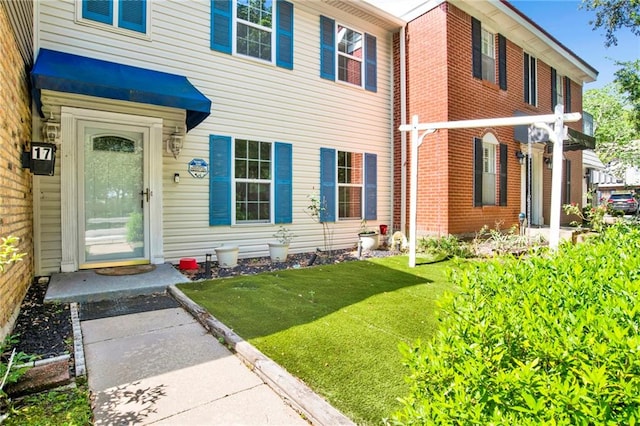 4017 Cottage Hill Rd Unit 17, Mobile, AL 36609 - view of exterior entry featuring a yard