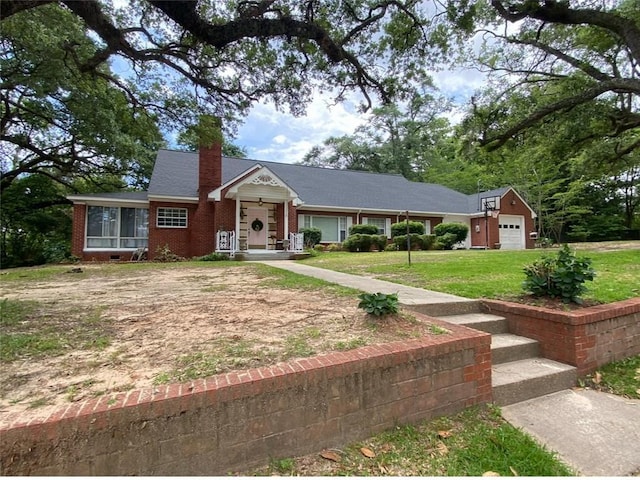 single story home with a garage and a front lawn