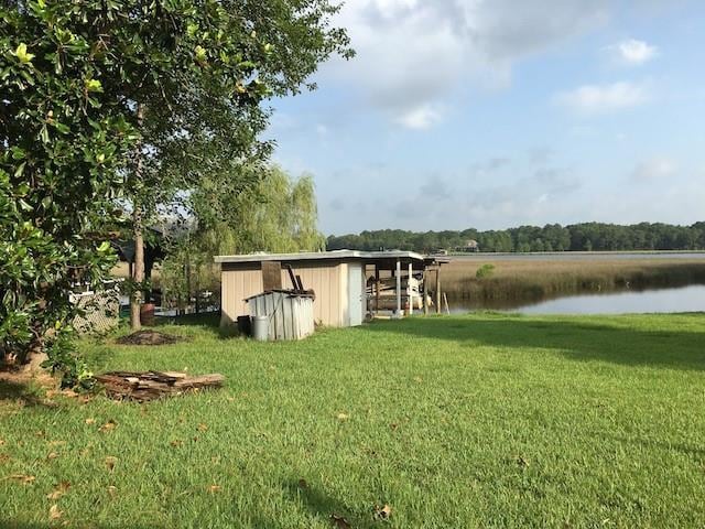 12236 Boulet Dr, Coden, AL 36523 - view of outbuilding with a water view and an outbuilding