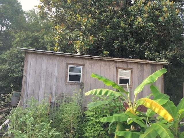 exterior space with an outbuilding