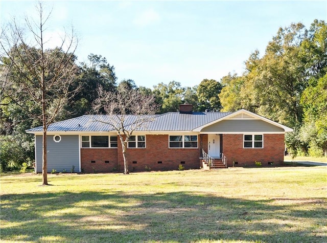 ranch-style home with a front yard