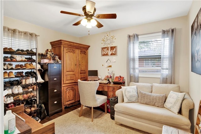 office area with dark hardwood / wood-style flooring and ceiling fan