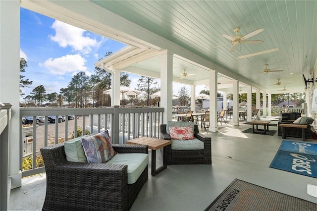 sunroom featuring wooden ceiling