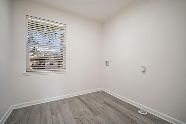 spare room with light wood-type flooring