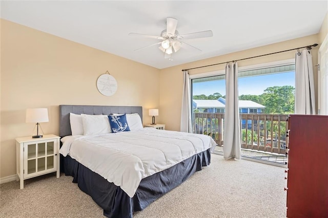 bedroom featuring access to exterior, ceiling fan, and light carpet