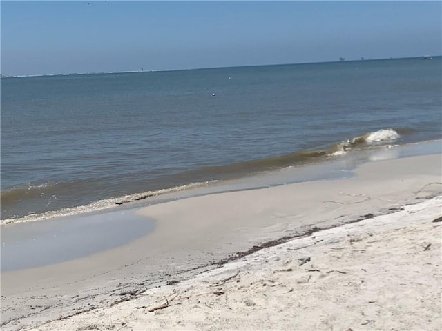 property view of water featuring a view of the beach