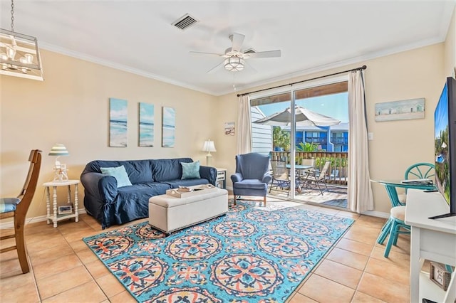 living room featuring ceiling fan, light tile patterned floors, and ornamental molding