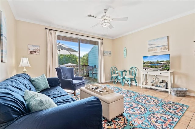 living room with light tile patterned floors, ceiling fan, and ornamental molding