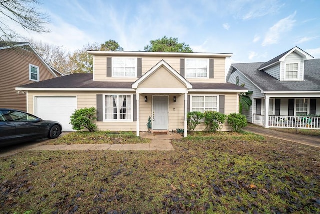 view of front of property featuring covered porch and a garage