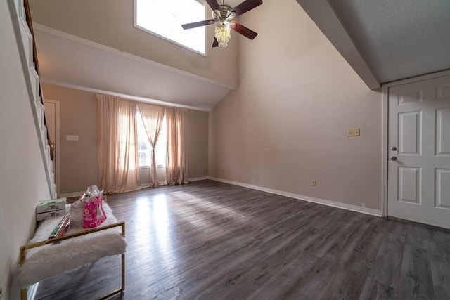 living room with dark hardwood / wood-style floors and ceiling fan