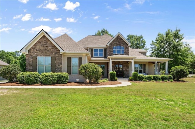 31928 Badger Ct, Spanish Fort, AL 36527 - view of front of home with a front lawn and stone siding
