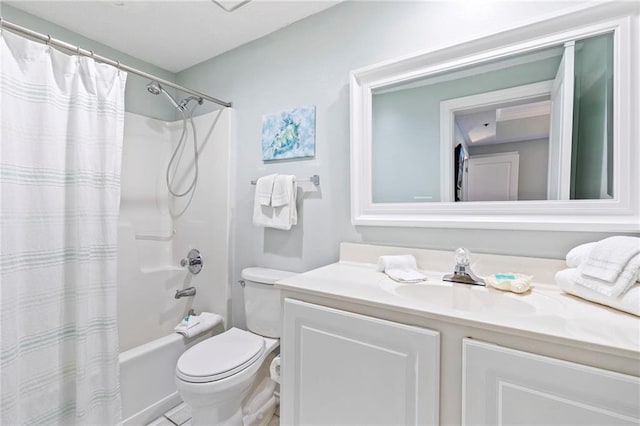 full bathroom featuring vanity, shower / bath combination with curtain, and toilet