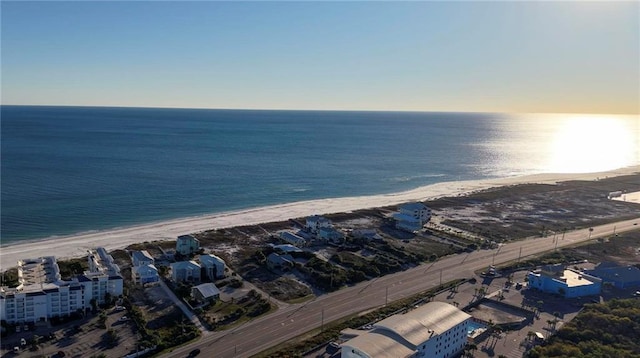 aerial view featuring a view of the beach and a water view