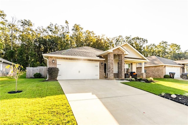 view of front of house with a garage and a front lawn