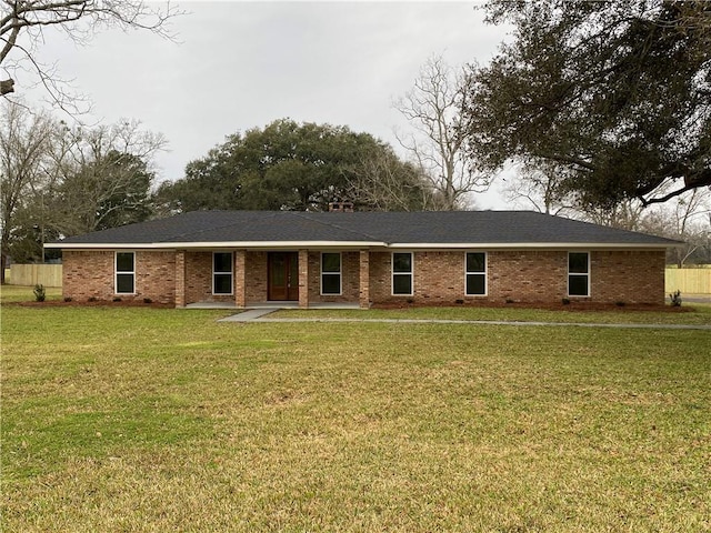 8960 Grand Bay-Wilmer Rd, Grand Bay, AL 36541 - ranch-style house with brick siding and a front lawn