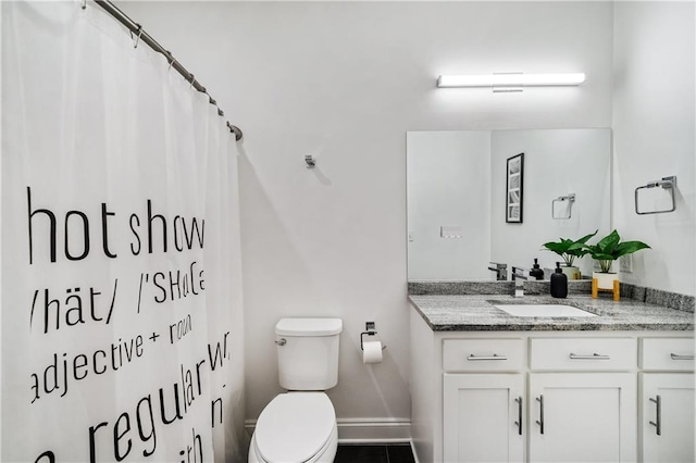 bathroom with vanity, a shower with curtain, and toilet