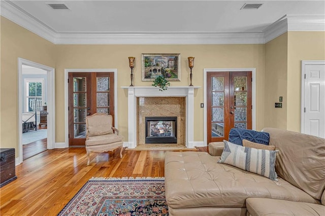 6400 Harbor Place Dr, Daphne, AL 36526 - living room featuring crown molding, visible vents, and french doors