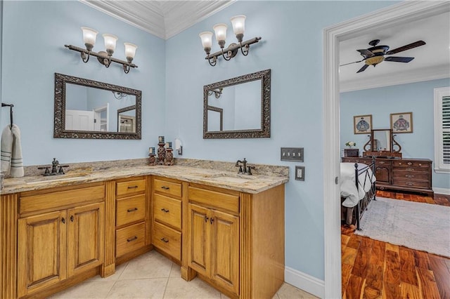 6400 Harbor Place Dr, Daphne, AL 36526 - bathroom with double vanity, ornamental molding, a sink, and ensuite bathroom
