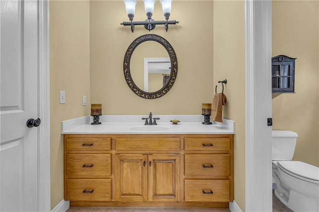 6400 Harbor Place Dr, Daphne, AL 36526 - bathroom featuring toilet, baseboards, and vanity