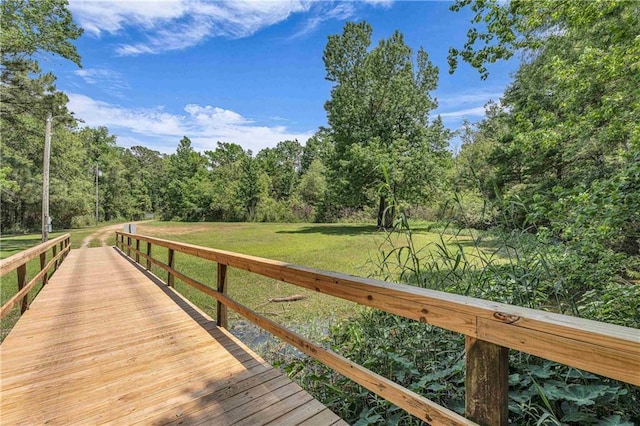 6400 Harbor Place Dr, Daphne, AL 36526 - dock area featuring a lawn and a forest view