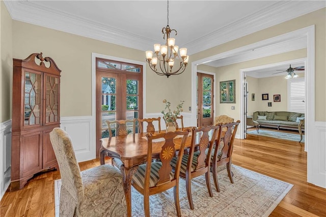 6400 Harbor Place Dr, Daphne, AL 36526 - dining area featuring crown molding, wainscoting, and light wood finished floors