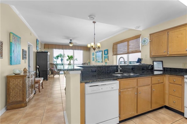 1801 Bienville Blvd Unit 213, Dauphin Island, AL 36528 - kitchen with dishwasher, a sink, light tile patterned floors, crown molding, and a peninsula