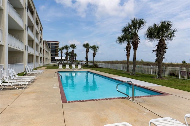 1801 Bienville Blvd Unit 213, Dauphin Island, AL 36528 - community pool with a patio