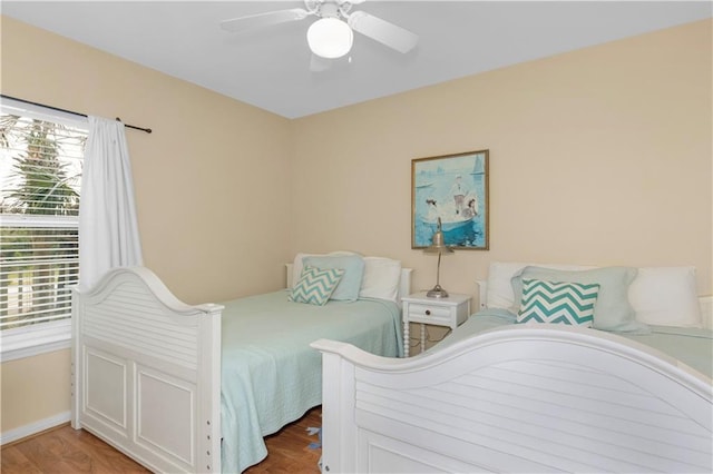 1801 Bienville Blvd Unit 213, Dauphin Island, AL 36528 - bedroom with a ceiling fan and baseboards