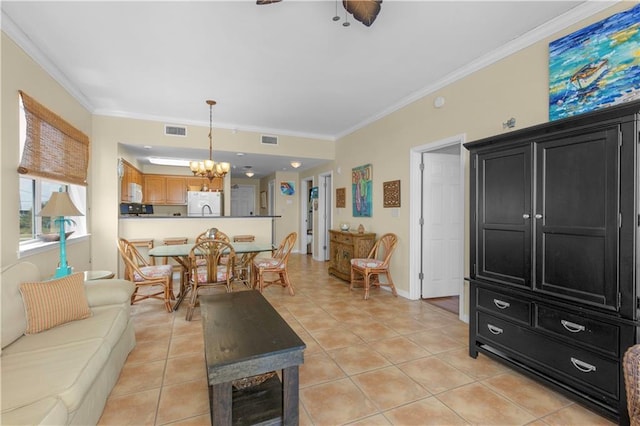 1801 Bienville Blvd Unit 213, Dauphin Island, AL 36528 - living room with a chandelier, ornamental molding, light tile patterned floors, and ceiling fan