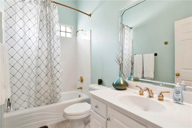 full bathroom featuring tile patterned flooring, vanity, toilet, and shower / tub combo with curtain