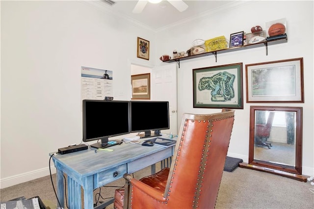 carpeted office featuring ceiling fan, baseboards, and crown molding