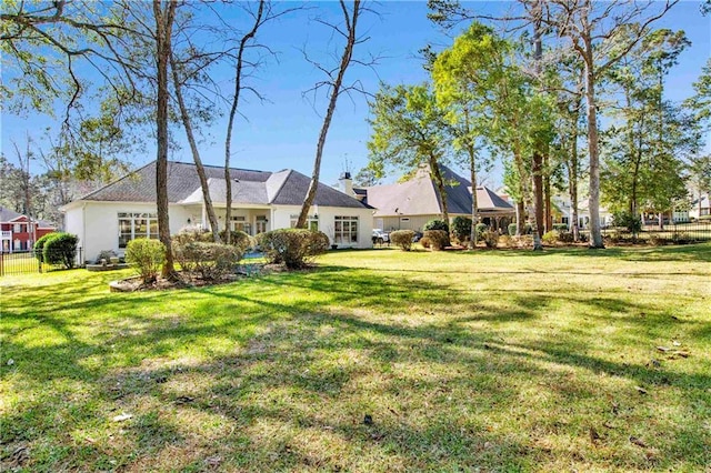 view of yard with fence