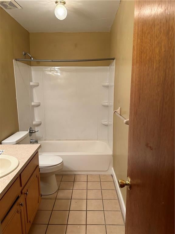 full bathroom with shower / bathtub combination, vanity, tile patterned flooring, and toilet