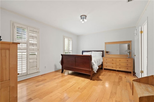 bedroom featuring light hardwood / wood-style floors