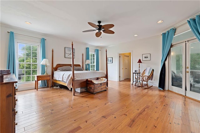 bedroom featuring ceiling fan, light wood-type flooring, and access to exterior