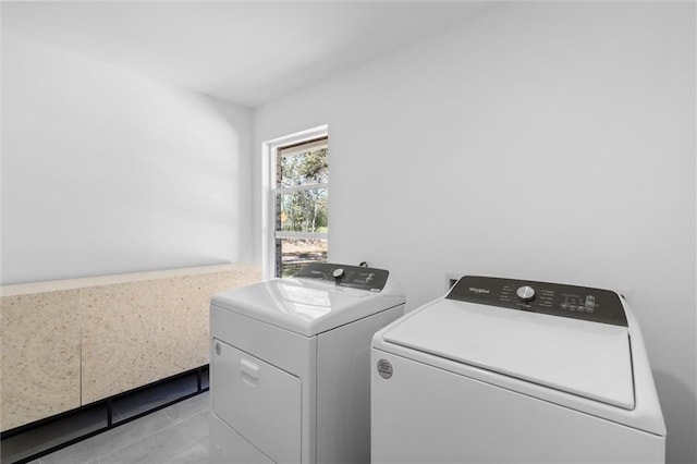 3158 Lees Ln, Mobile, AL 36693 - washroom with independent washer and dryer, light tile patterned flooring, and laundry area