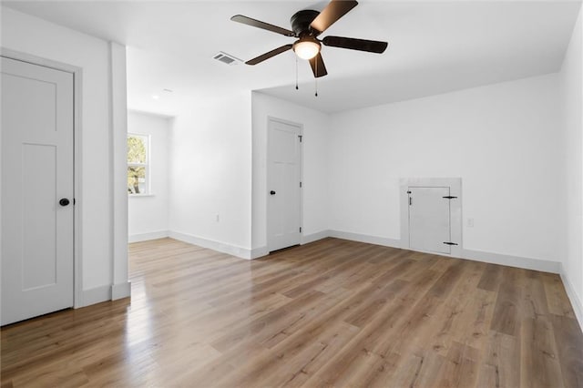 3158 Lees Ln, Mobile, AL 36693 - unfurnished room with light wood-type flooring, baseboards, a ceiling fan, and visible vents