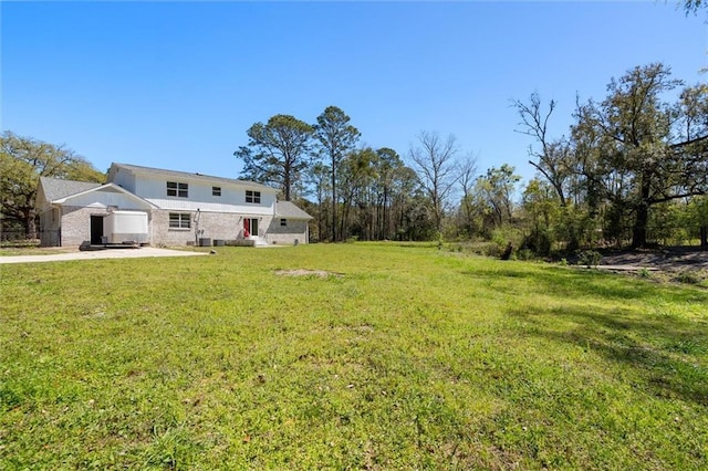 3158 Lees Ln, Mobile, AL 36693 - view of yard featuring a garage and driveway