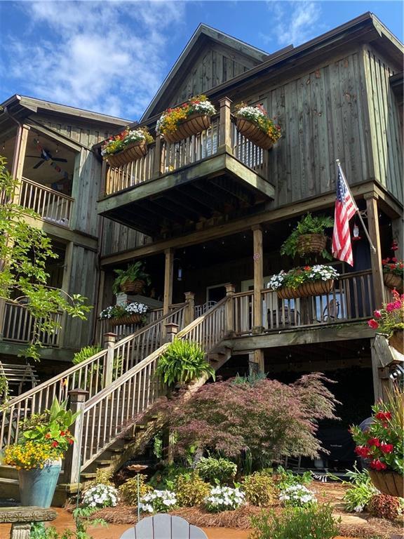 rear view of house featuring a balcony