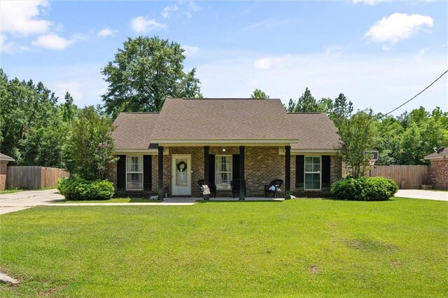 1411 Creola Axis Loop Rd, Axis, AL 36505 - view of front of home featuring covered porch, brick siding, and a shingled roof