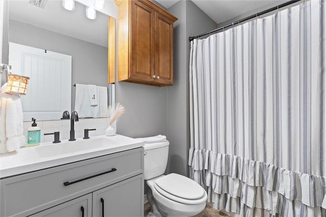 1411 Creola Axis Loop Rd, Axis, AL 36505 - full bath featuring toilet, backsplash, vanity, and curtained shower